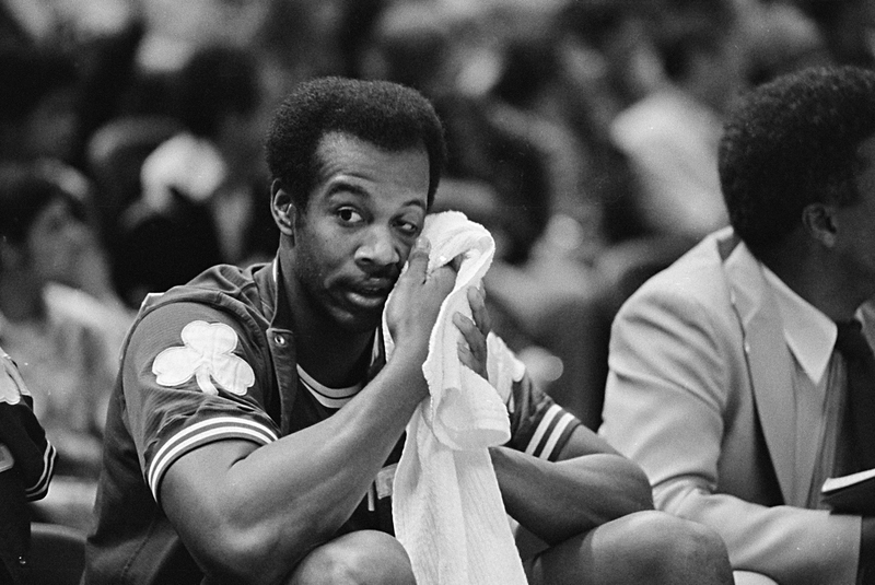 Washington sits on the bench during his first game after the punch. Photo credit: AP